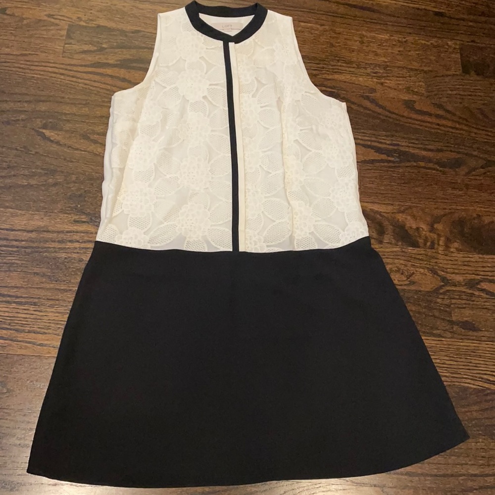 Loft dress in darling colorblocked design. Black and cream.